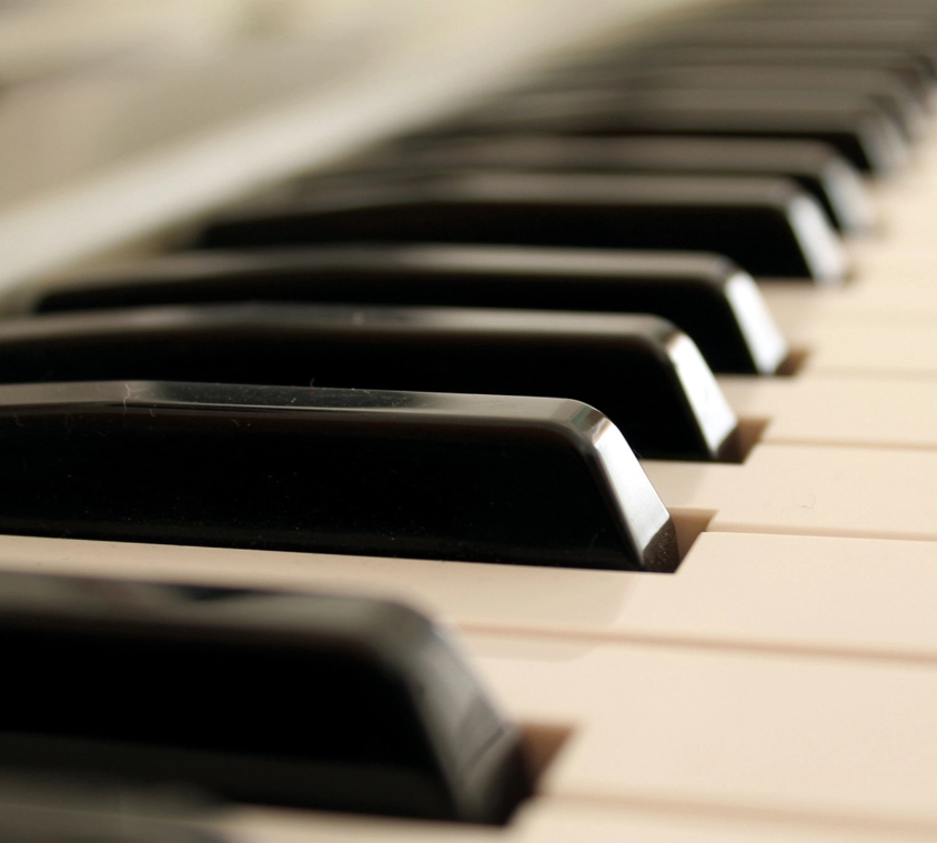 Close‑ups of a piano’s keys.